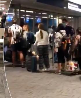 Shocking Footage Shows Crowds Huddled Together At Australian Airport Amid Social Distancing Rules
