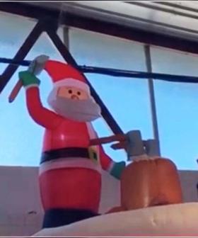 Bunnings Has A New ‘Axe Throwing Santa’ Inflatable That Could Easily Pass For Halloween