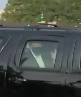 US President Donald Trump Waves To Supporters In Surprise Drive-By